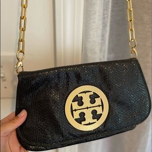 Reva Tory Burch Black and gold crocodile cross body clutch
